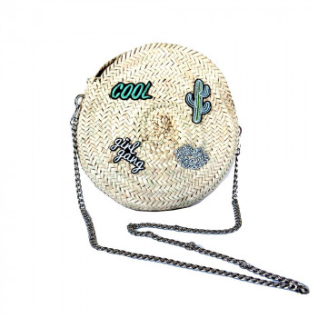 round straw bag with patches by maud fourier paris