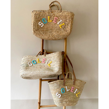 beach straw baskets by maud fourier