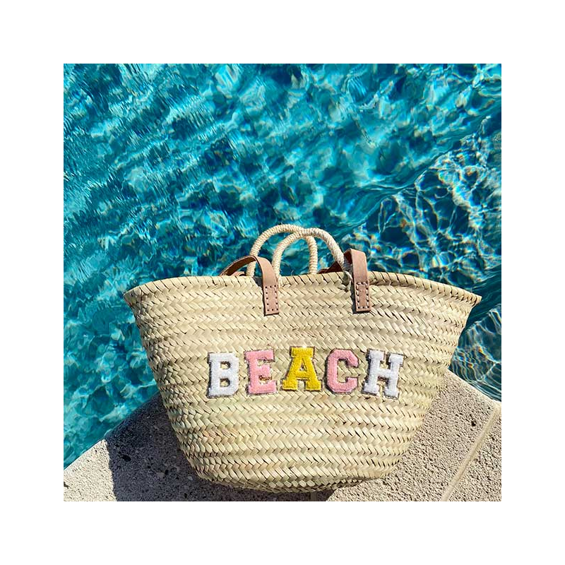 beach straw basket by maud fourier