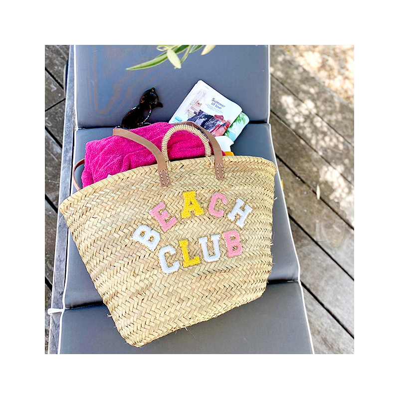 Straw basket with colorful bouclé BEACH CLUB letters