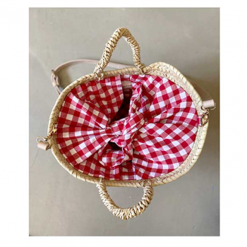 small straw basket with red cotton gingham by maud fourier paris