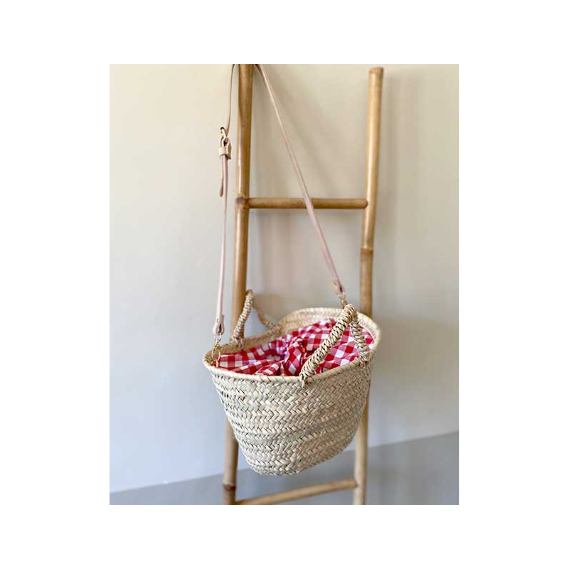 small straw basket lined with red cotton gingham by maud fourier