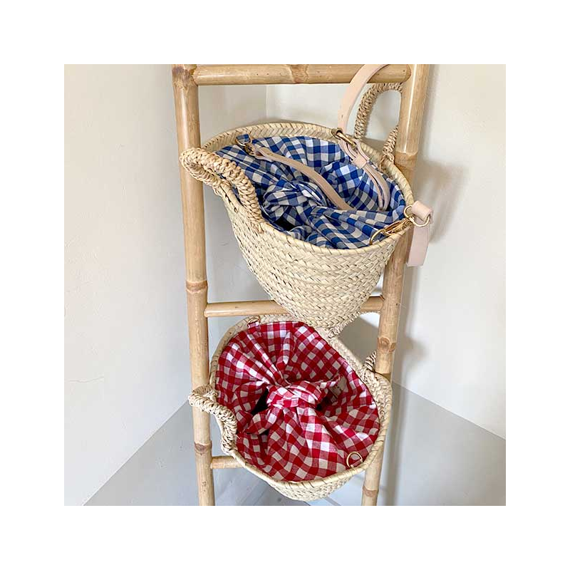 small straw basket lined with cotton gingham by maud fourier paris