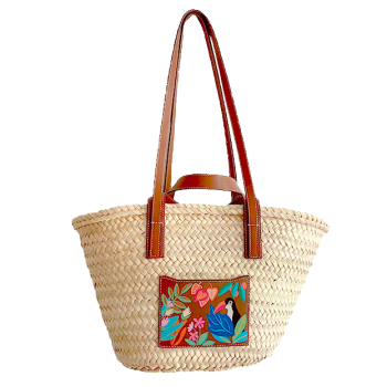 Hand-painted straw basket with leather handles and toucan motif
