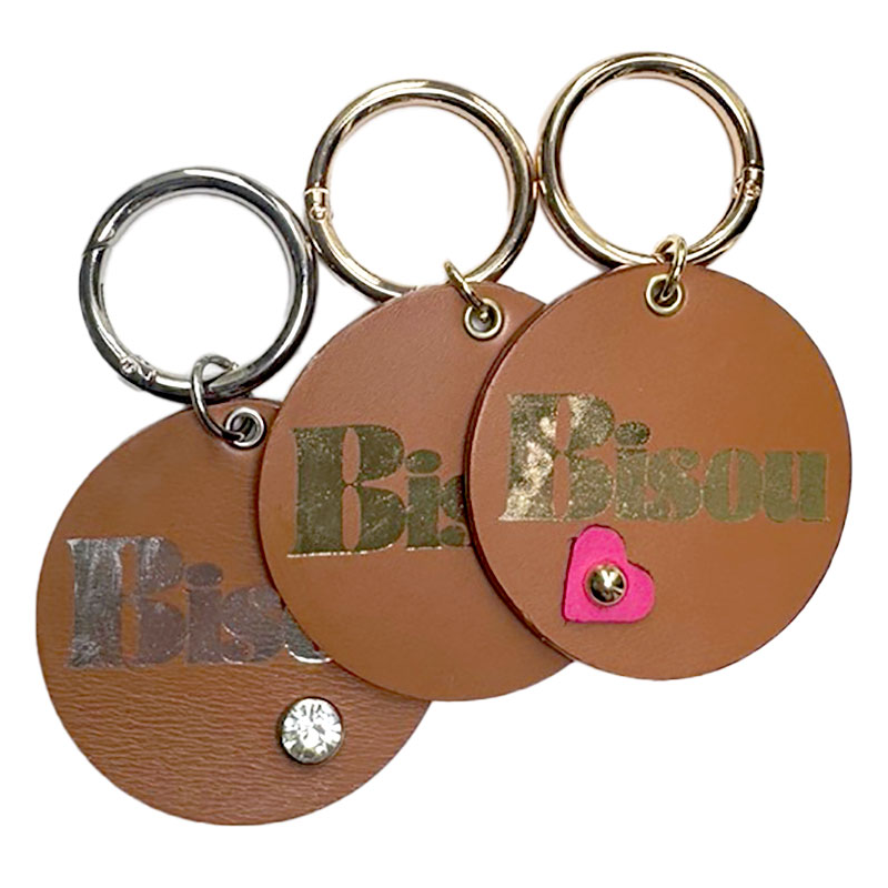 Round camel leather “bisou” charm silver-stamped with matching ring