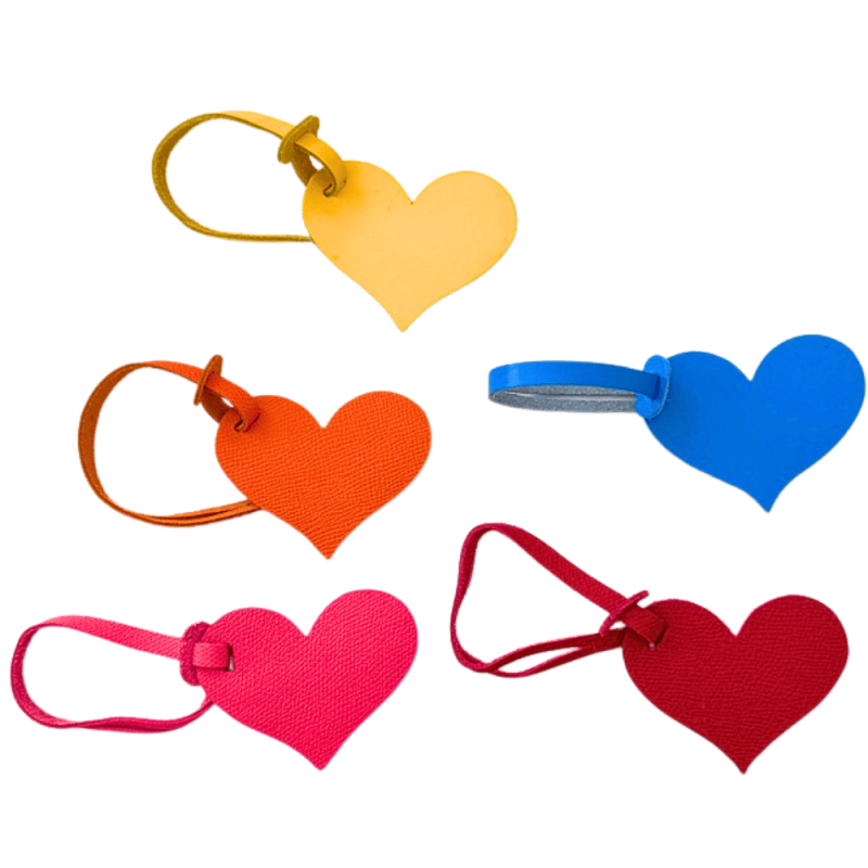 Upcycled leather heart bag charms handmade in Paris in five colours
