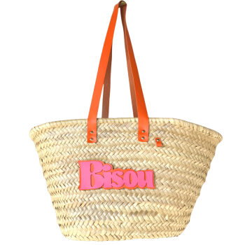 Bisou straw basket with orange leather handles and hand-sewn leather lettering