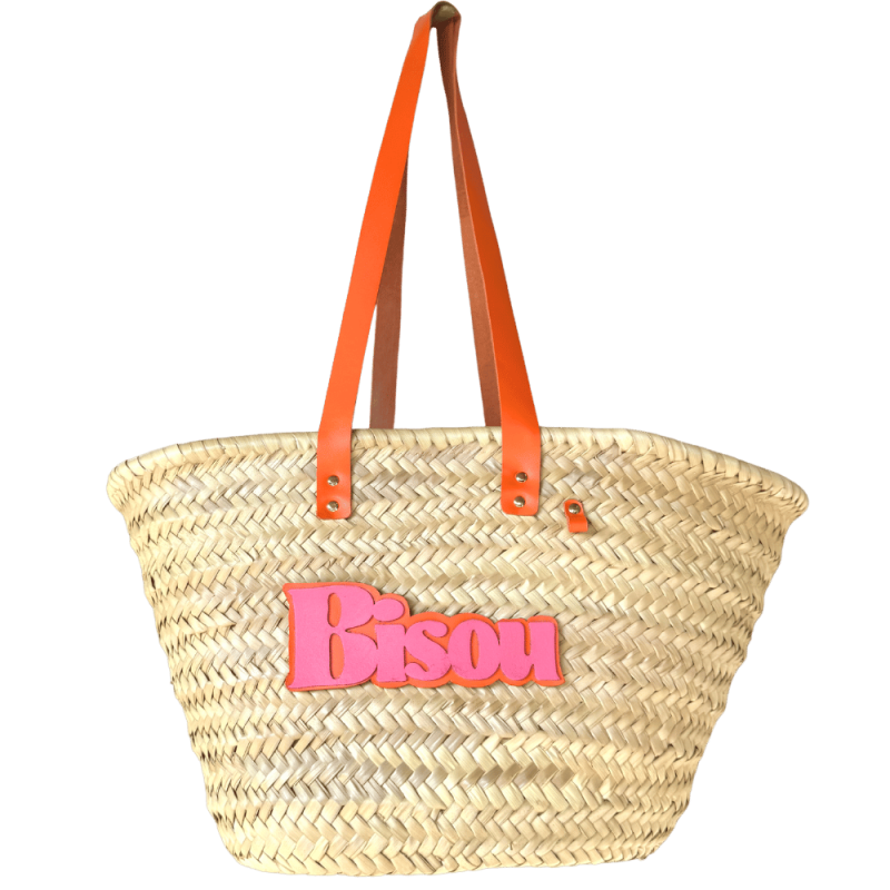 Bisou straw basket with orange leather handles and hand-sewn leather lettering