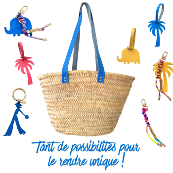 Straw basket with bright blue leather handles