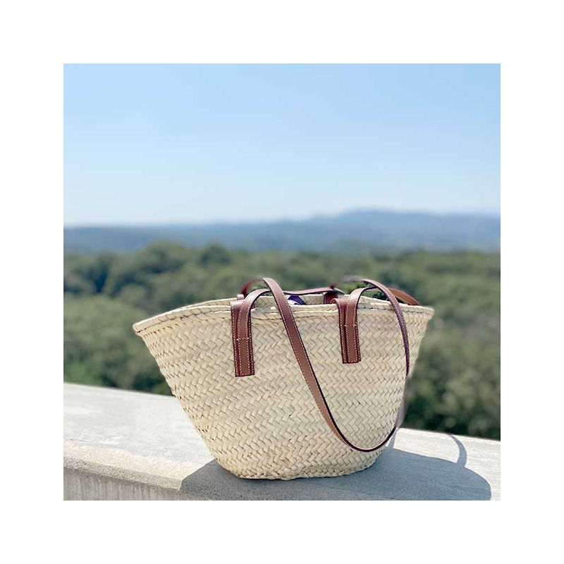 Handwoven palm leaf basket with pink leopard leather detail