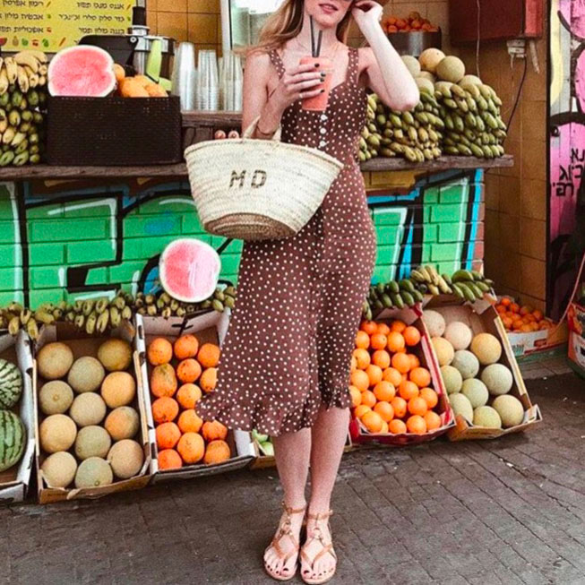 Customized Maud Fourier basket carried outdoors